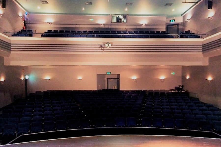 A view from a stage onto an empty seating area