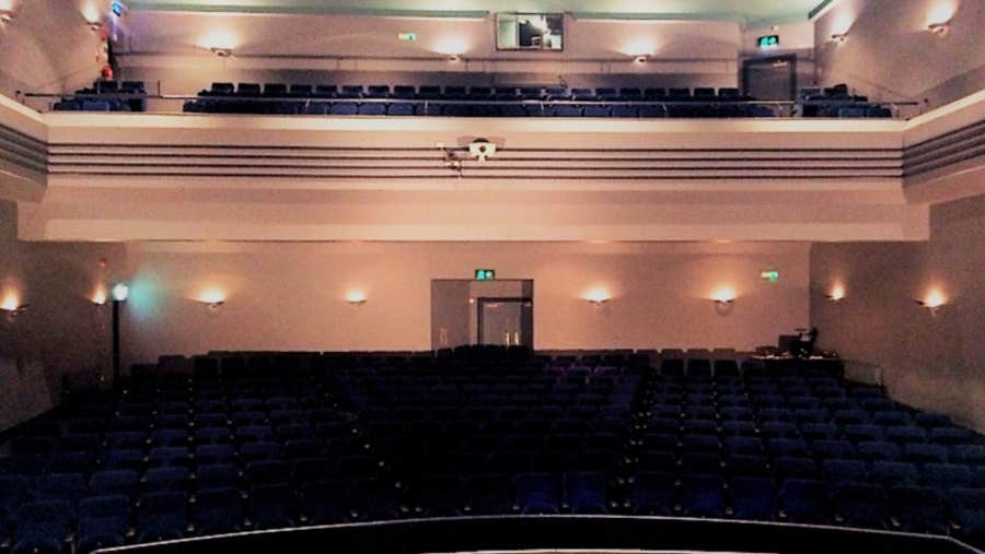 A view from a stage onto an empty seating area