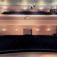 A view from a stage onto an empty seating area