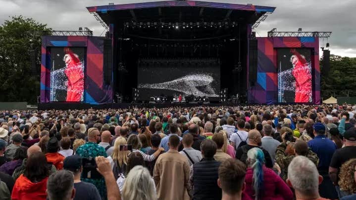 Malahide Castle Concert 2026 - looking at a large outdoor stage with large audience