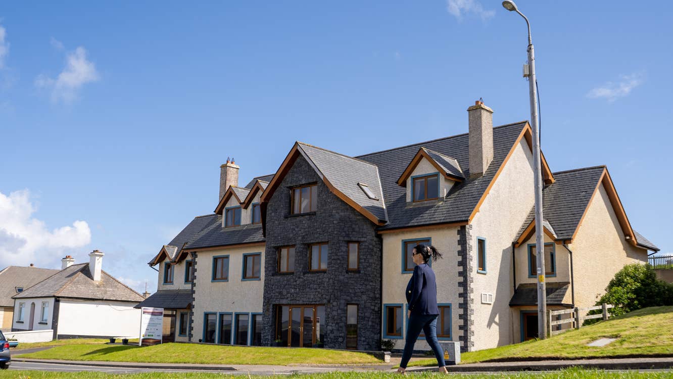 Exterior of building with lawned garden.