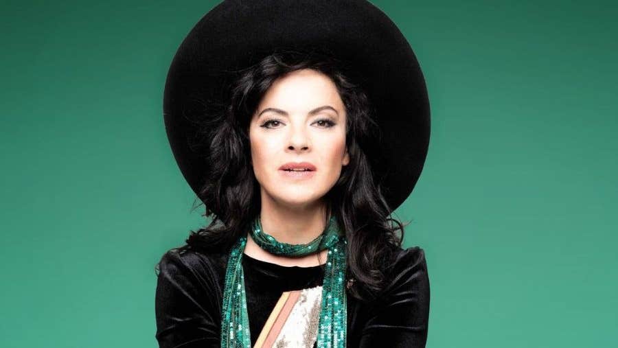 Camille O'Sullivan: Loveletter - A lady in a large black hat.