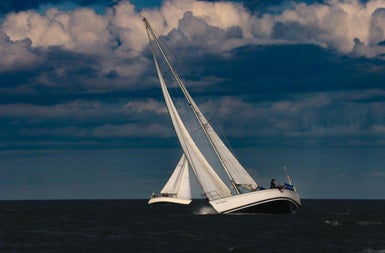 Two yachts on a dark day on Dublin Bay