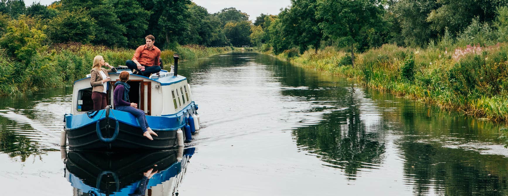 People on a barge in a canal in County Kildare
