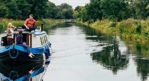 People on a barge in a canal in County Kildare