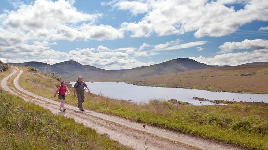 Two people walking the trails at Glenveagh National Park in County Donegal.
