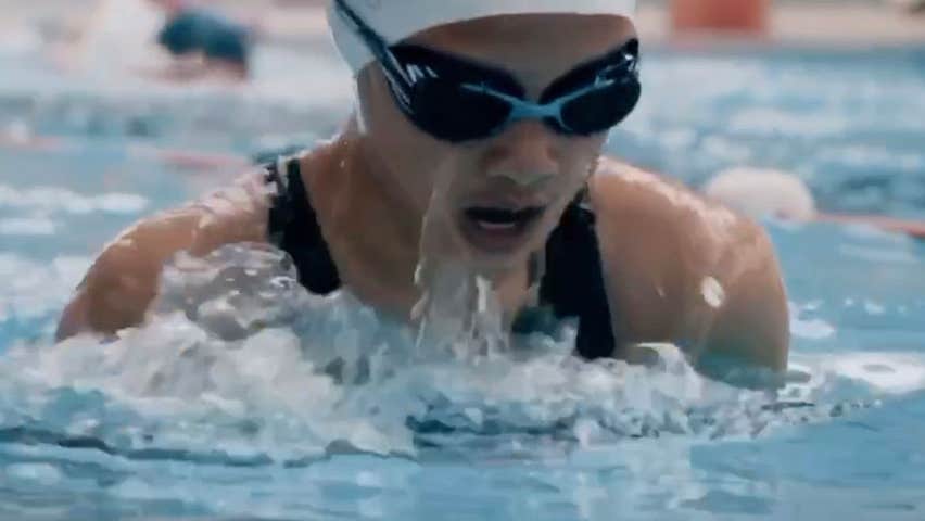A person wearing goggles swimming in Coral Leisure Cobh swimming pool