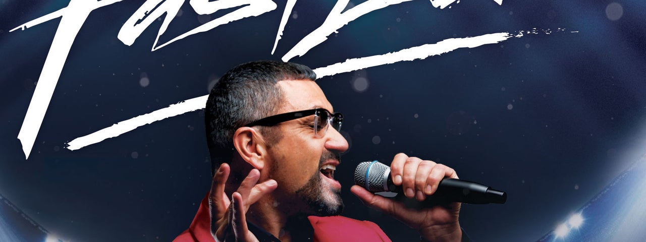 A man in sunglasses is singing into a mic