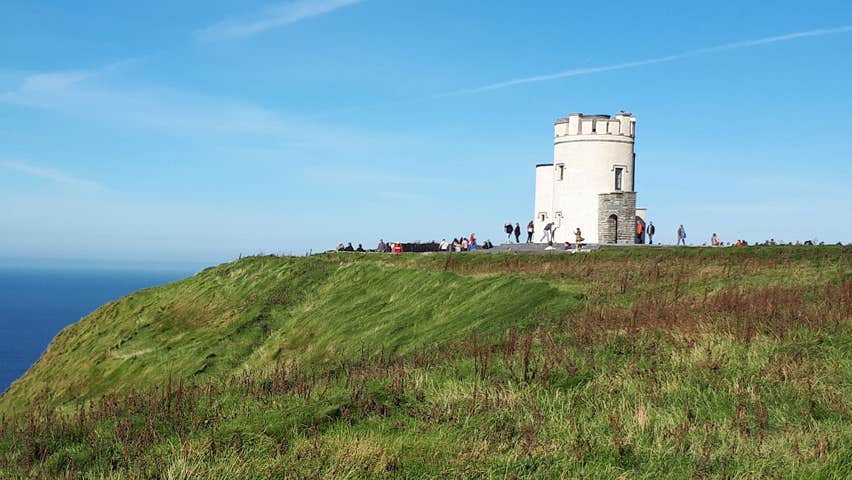 Visitors at O Briens Tower on a bright day with blue skies