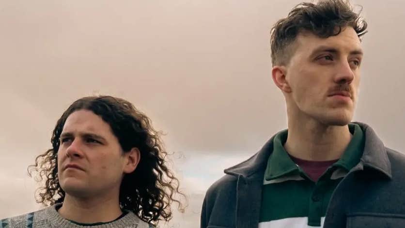 2 men looking into the distance