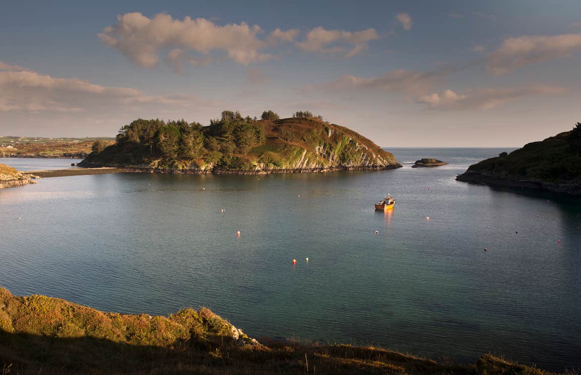 A boat sailing in Lough Hyne in Skibbereen, Co Cork.