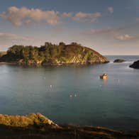 A boat sailing in Lough Hyne in Skibbereen, Co Cork.