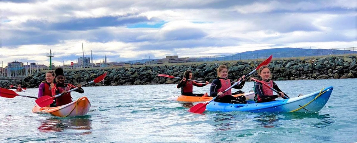 Image of  people kayaking in harbour at Dun Laoghaire