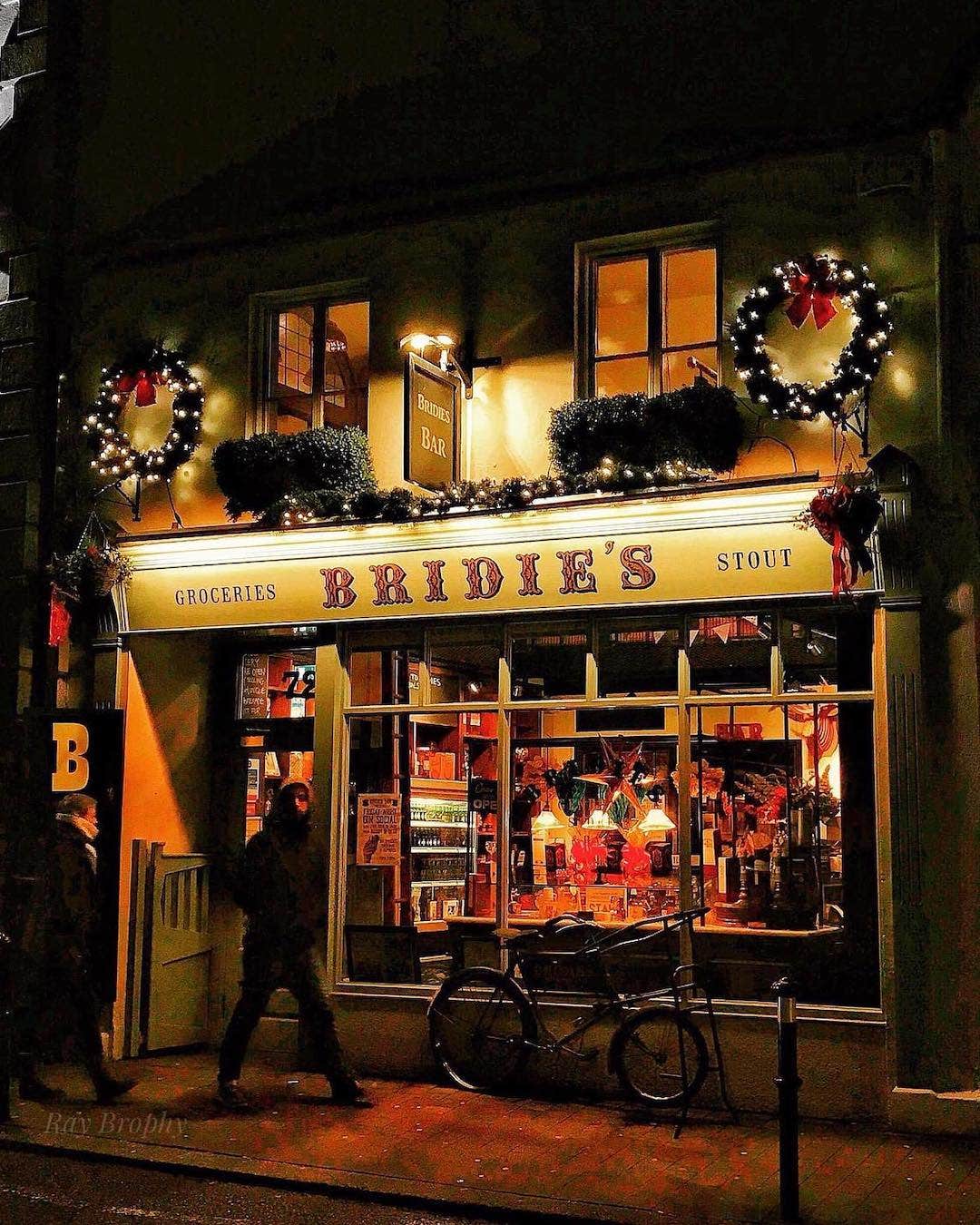 Visit Bridie's, an old-world bar and general store with a charming walled garden.