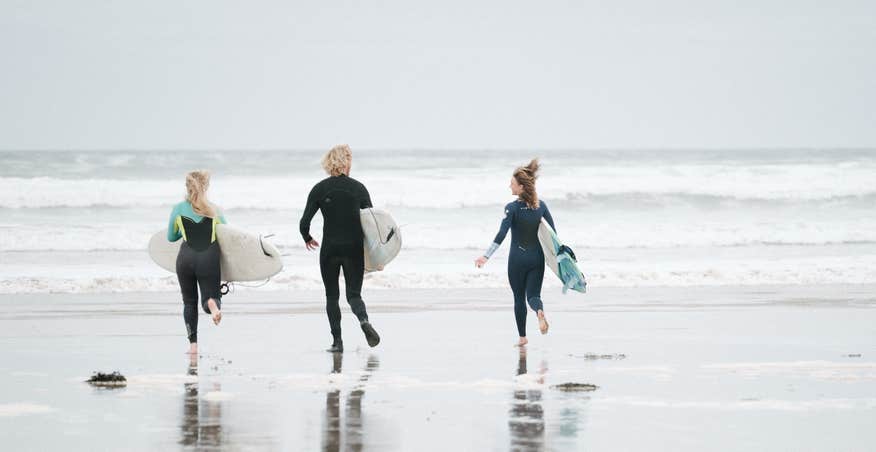 Surfers at Lahinch Beach in County Clare