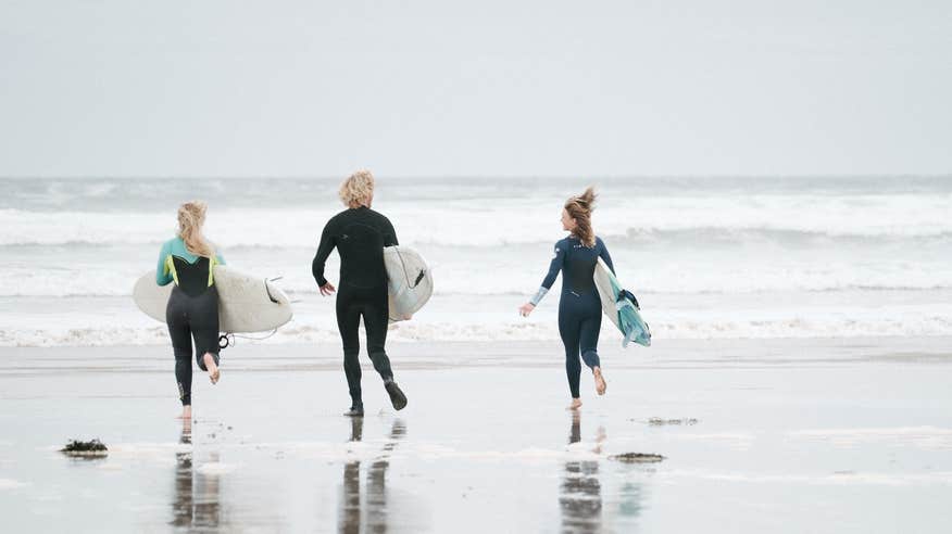 Surfers at Lahinch Beach in County Clare