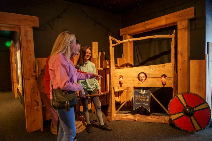 A family taking part in the immersive exhibitions at Knights and Conquests Exhibition Centre in Granard, County Longford.