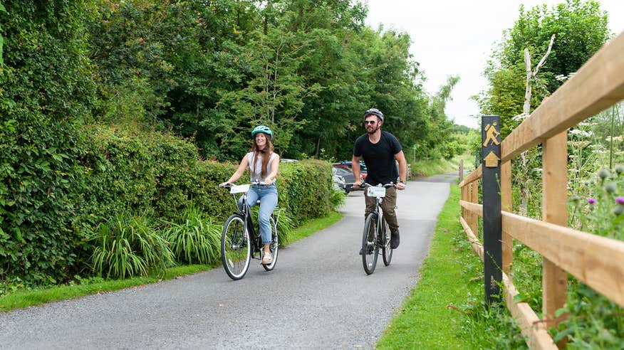 A couple cycling the Royal Canal Greenway in County Westmeath