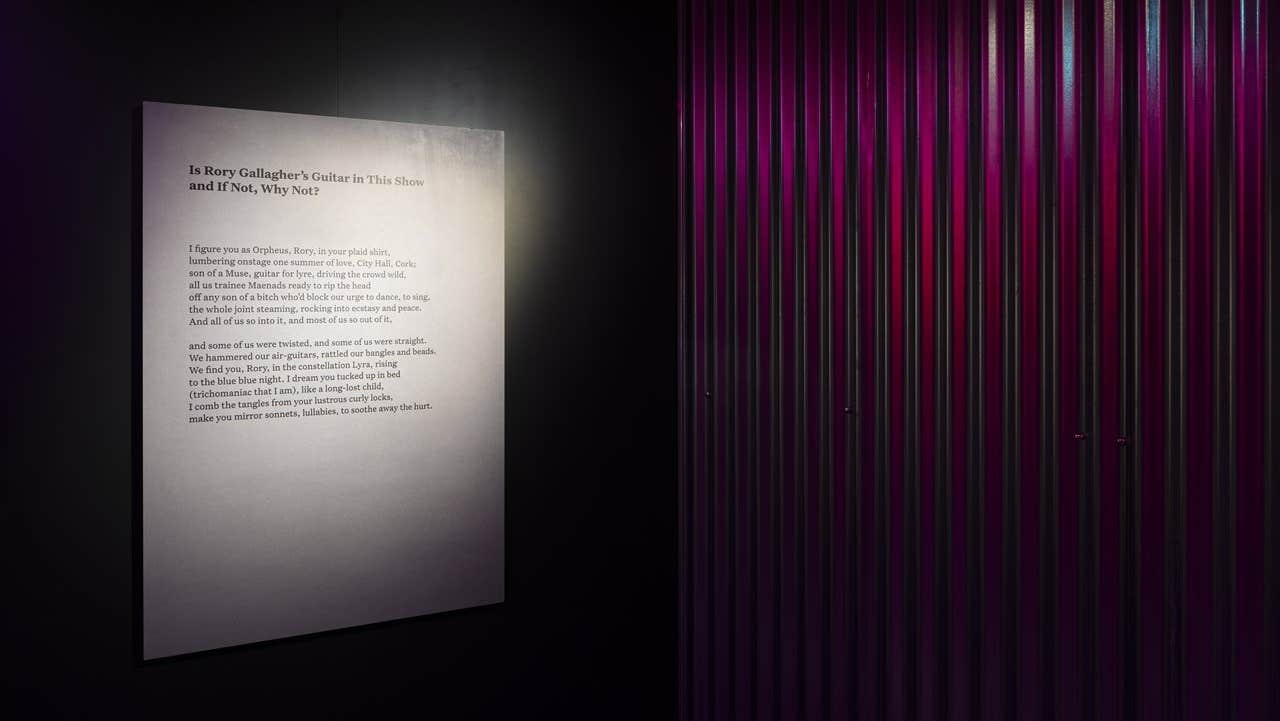Image of Paula Meehan's poem 'Is Rory Gallagher's Guitar in This Show and If Not, Why Not?' from the Changing Ireland galleries at Collins Barracks