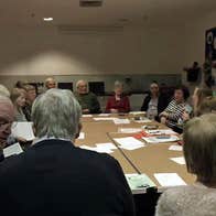 Mayo Genealogy Group, a group of people seated around tables pushed together in a room