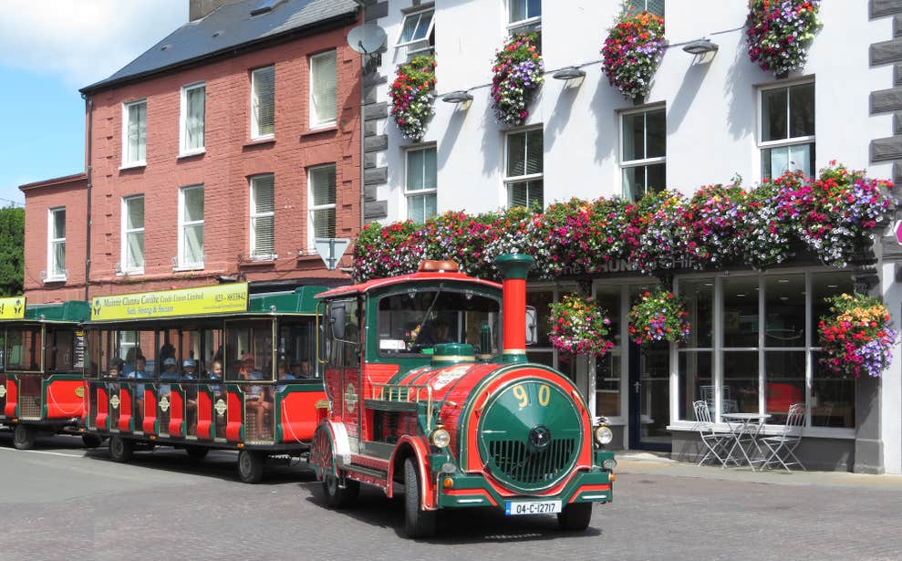 People riding the Road Train in Clonakilty in County Cork