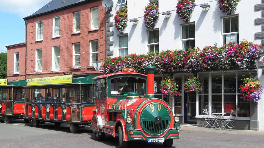 People riding the Road Train in Clonakilty in County Cork