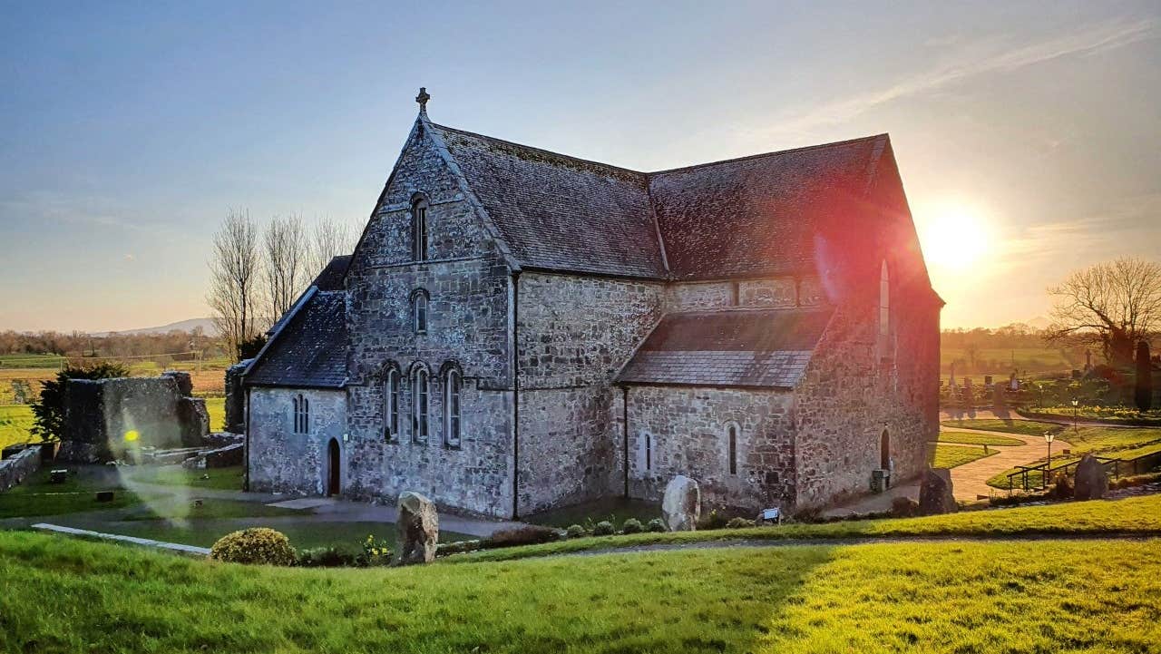 Exterior of Ballintubber Abbey at sunset