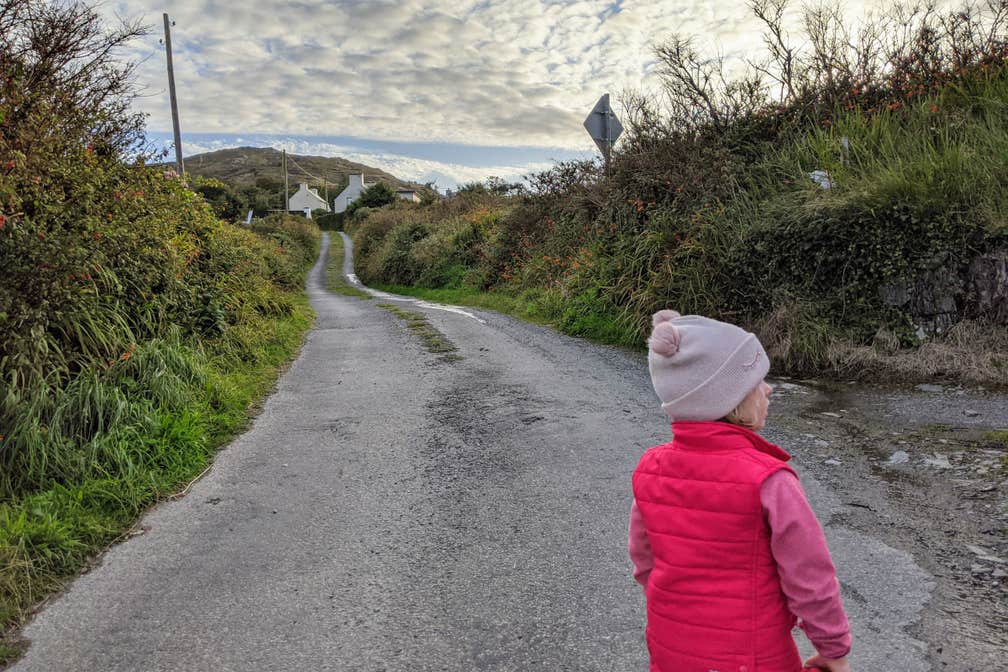 Image of a young girl walking in Bere Island in County Mayo