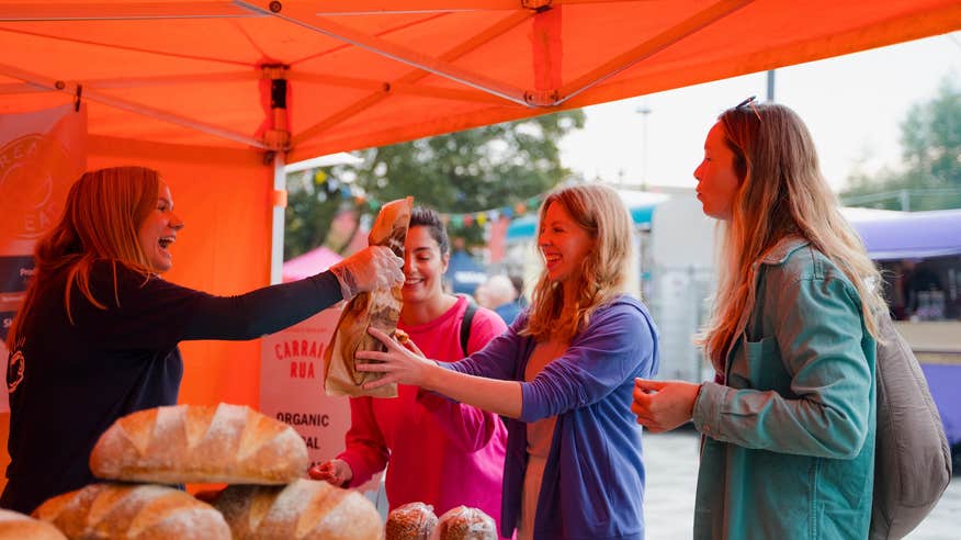 People getting bread from a food stall in Co Sligo