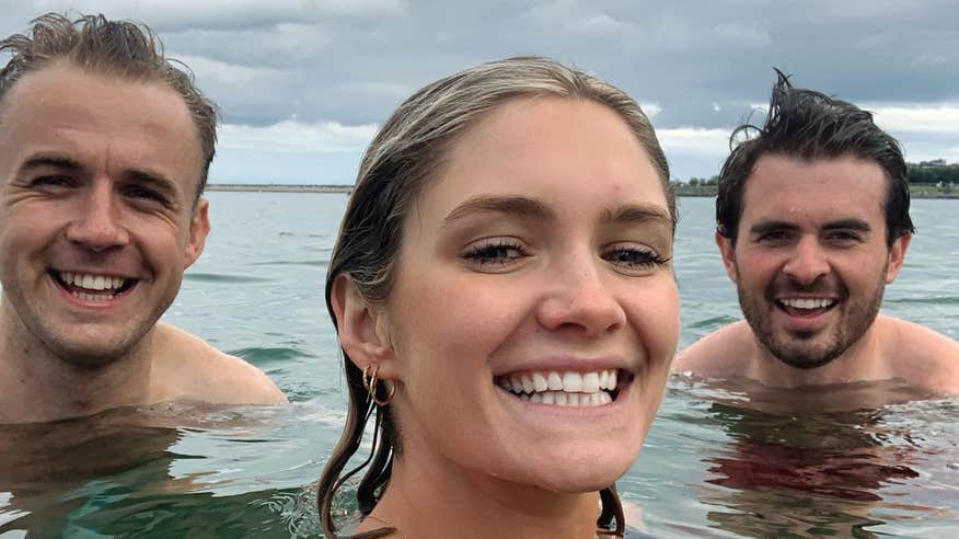 Niamh Cullen swimming in Dublin with two friends.