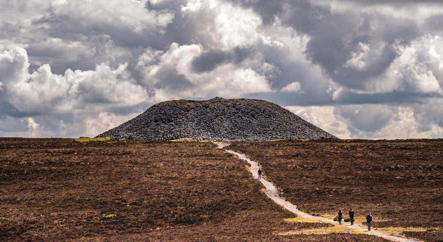 People hiking Knocknarea Mountain in County Sligo