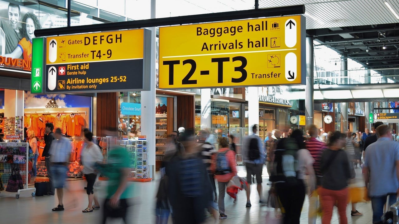 Lots of people in an airport terminal