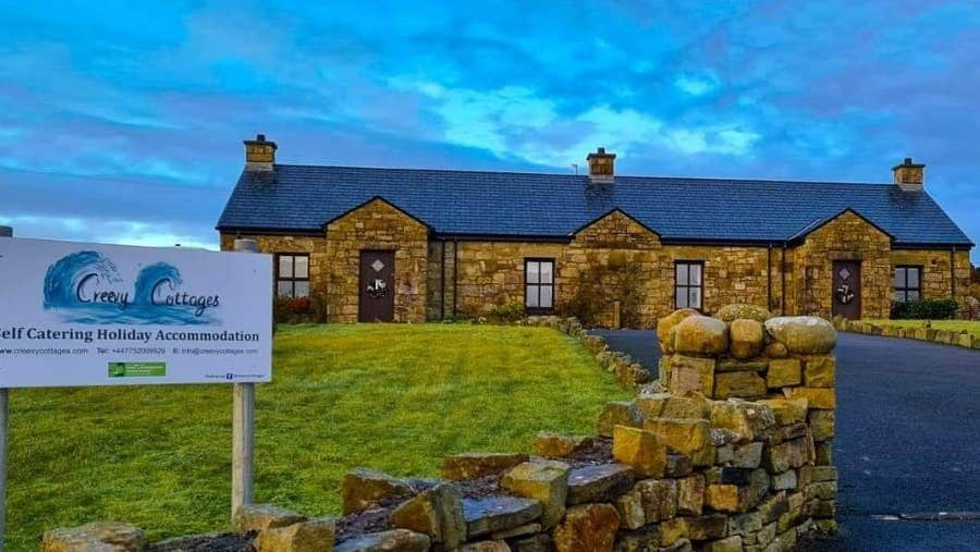 Stone house with green garden
