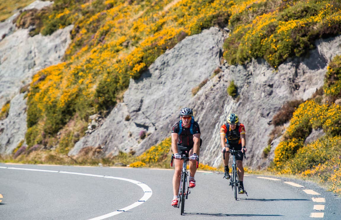 Two cyclists cycling the Ring of Kerry, County Kerry