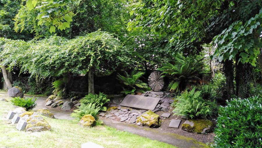 A view of the sculpture and fern area that pays tribute to the missionaries from the Killarney area