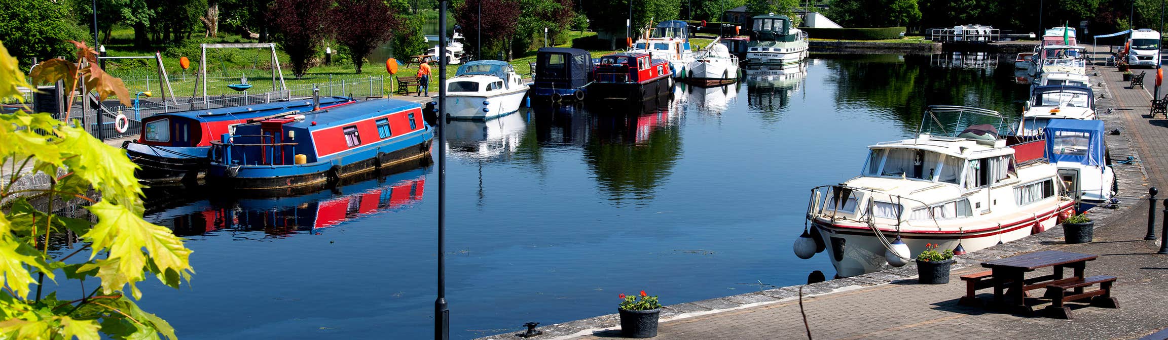 Colourful boats docked in Clondra harbour in Longford