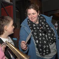 Image of a family engaging with Handling Objects