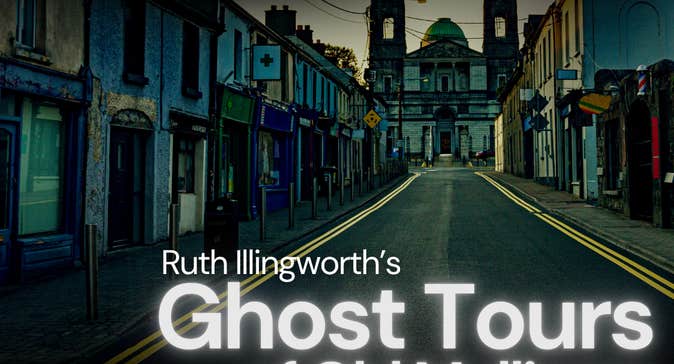 Ghost Tours of Old Mullingar - a view of an empty street at dusk with a church in the distance at the end of the road.