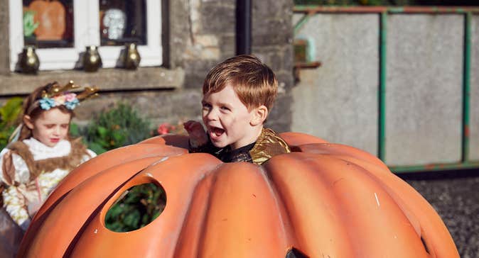 A boy and girl at Causey Farm in County Meath during Halloween.