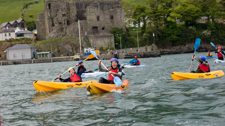 Several kids kayaking at Carlingford Adventure Centre in County Louth