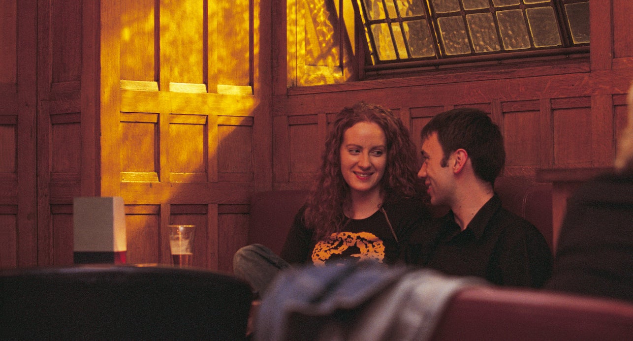 A couple sitting in the Clarence Hotel bar in County Dublin