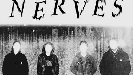 Black and white grainy photo of 4 people in a line with their faces blank in white.
