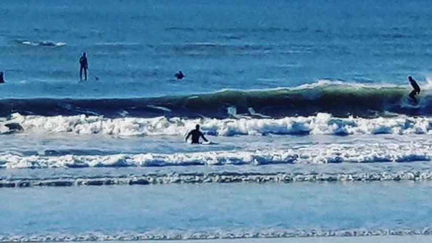 Atlantic Offshore Adventures view of people enjoying surfing the waves