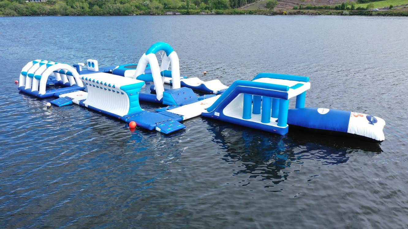 An inflatable obstacle course floating on water