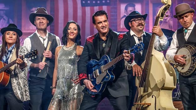 A line of 6 various performers with musical instruments.
