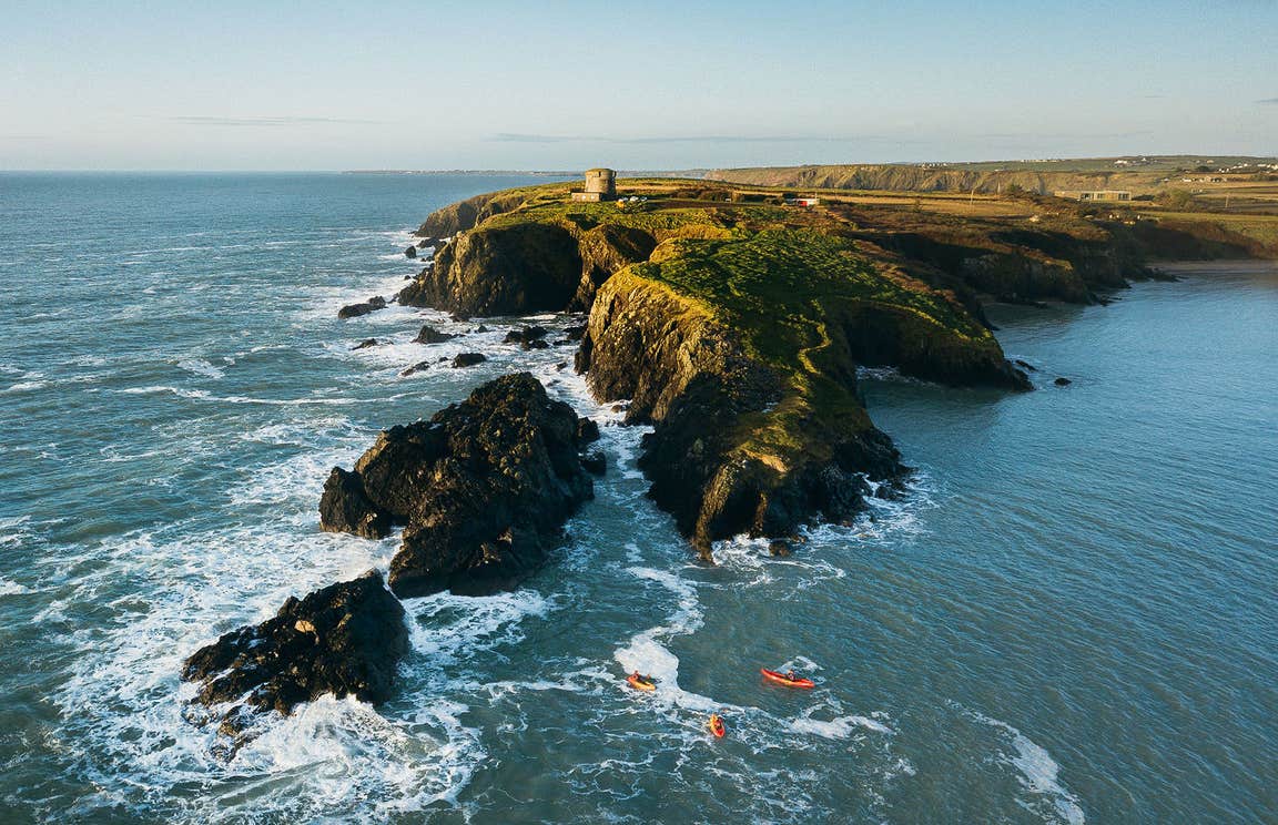 Aerial view of people kayaking along Hook Peninsula in Co Wexford