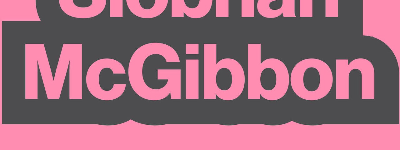 Dull pink background with black block in centre containing same colour pink writing.
