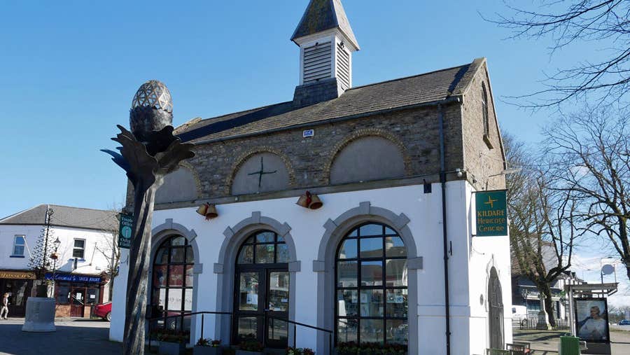 Exterior image of Kildare Town Heritage Centre Building on a sunny day with blue sky behind