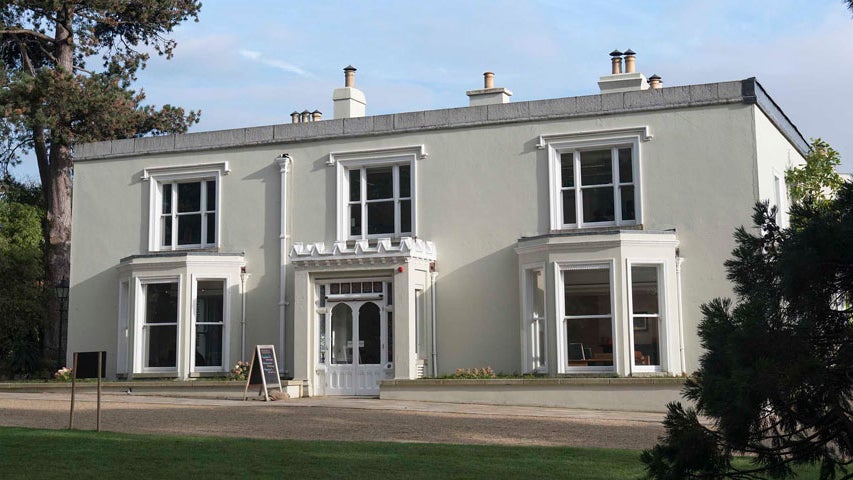 The exterior of Airfield House on the grounds of Airfield Estate