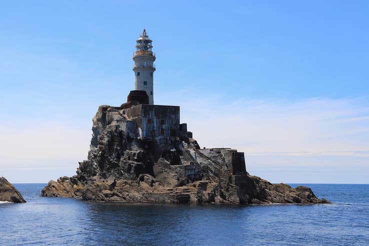 Image of Fastnet Lighthouse county Cork, on a clear day with bright blue skies.